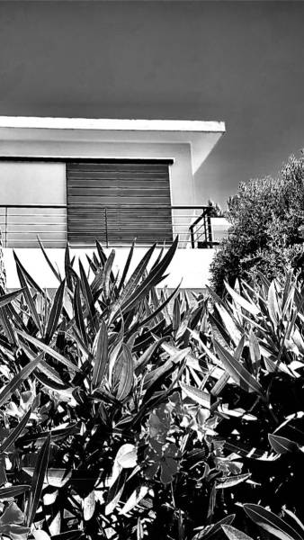 Fabricant de volets coulissants à lames horizontales en sipo pour une villa à Marseille